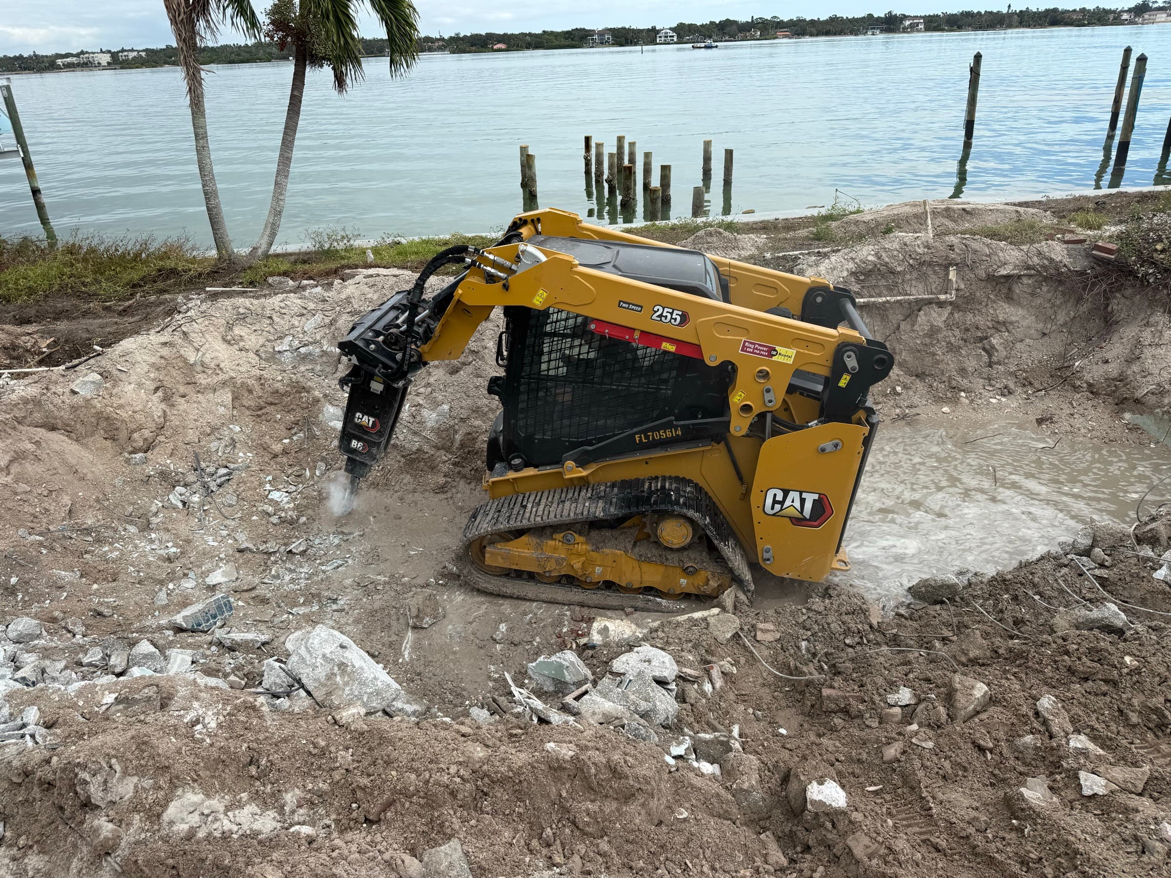 Mojo demolition and excavation debris removal near a waterfront property